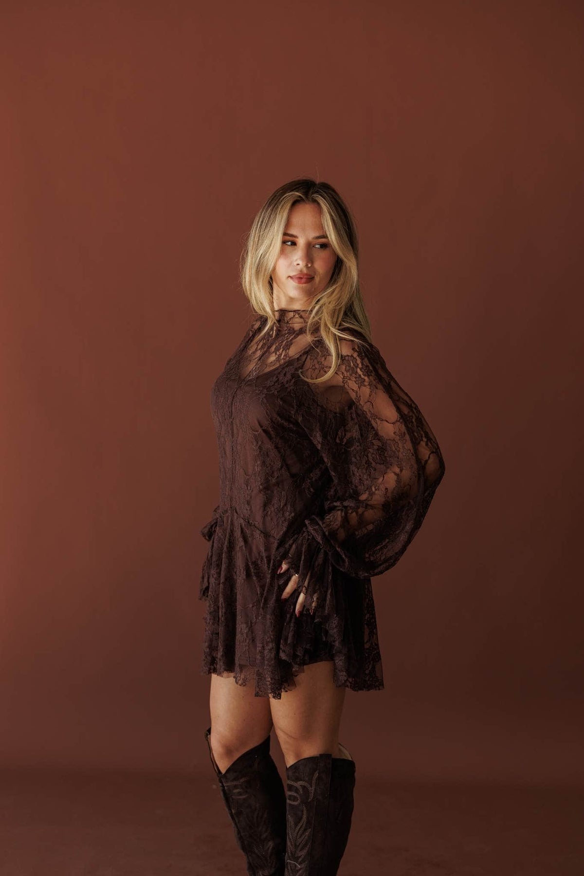 Lace Legend Mini Dress, in chocolate, side view with tall boots