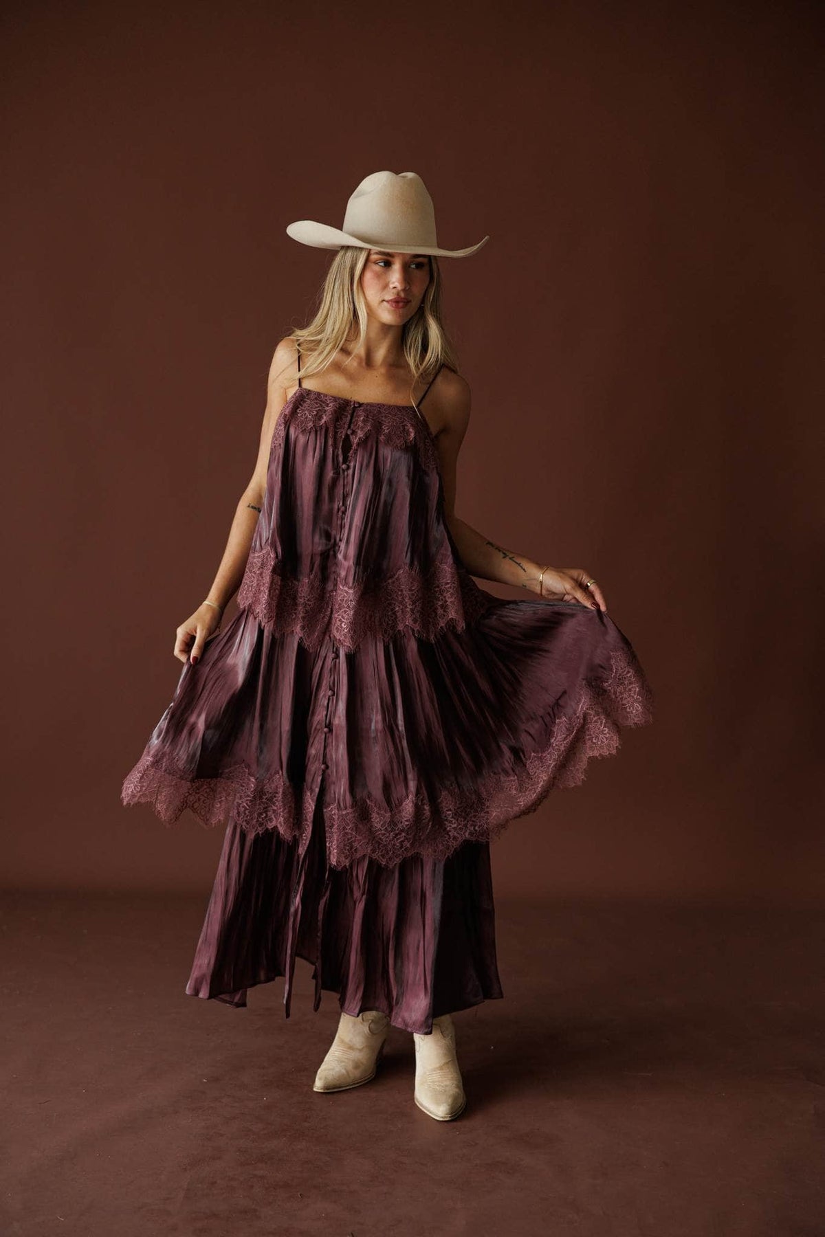 Where The Wildflowers Grow Maxi Dress in plum, full-length walking view with a cream cowboy hat
