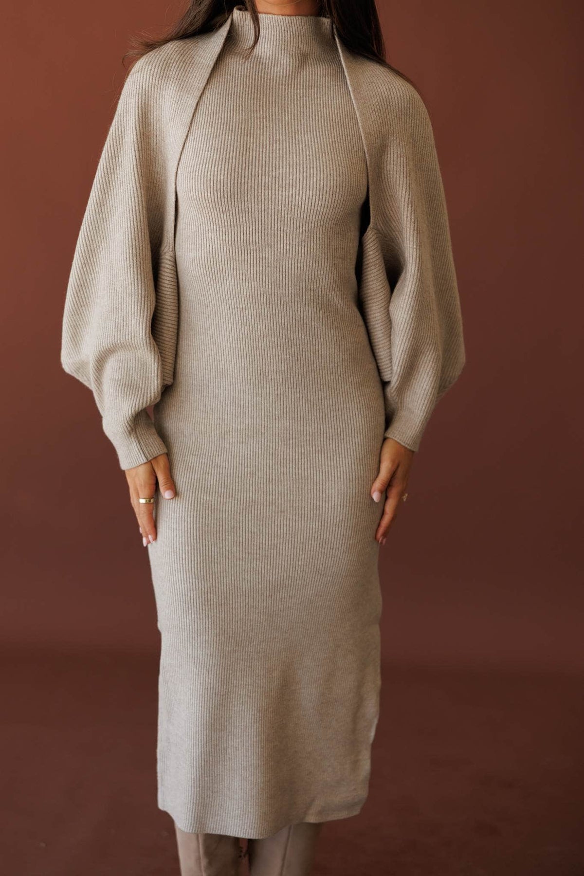 Serving Looks Sweater Dress, in cloud grey, front view of the mock neck and shoulders