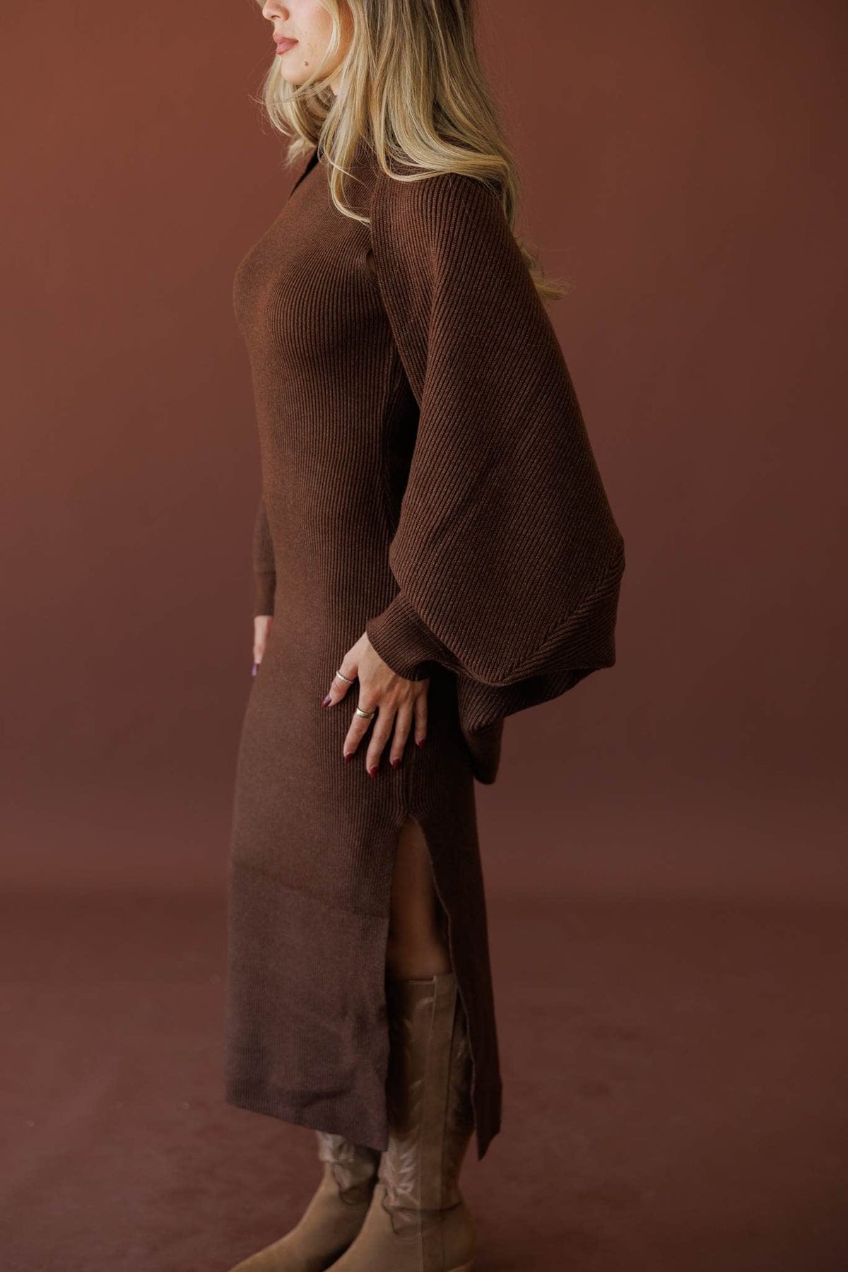 Serving Looks Shrug, in chocolate, side view of the wide sleeve