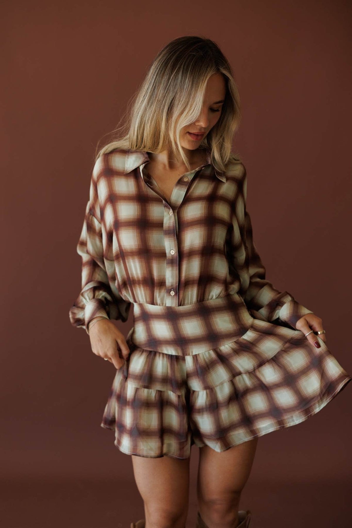 Plaid Lane Romper, front view of the button front and tie waist
