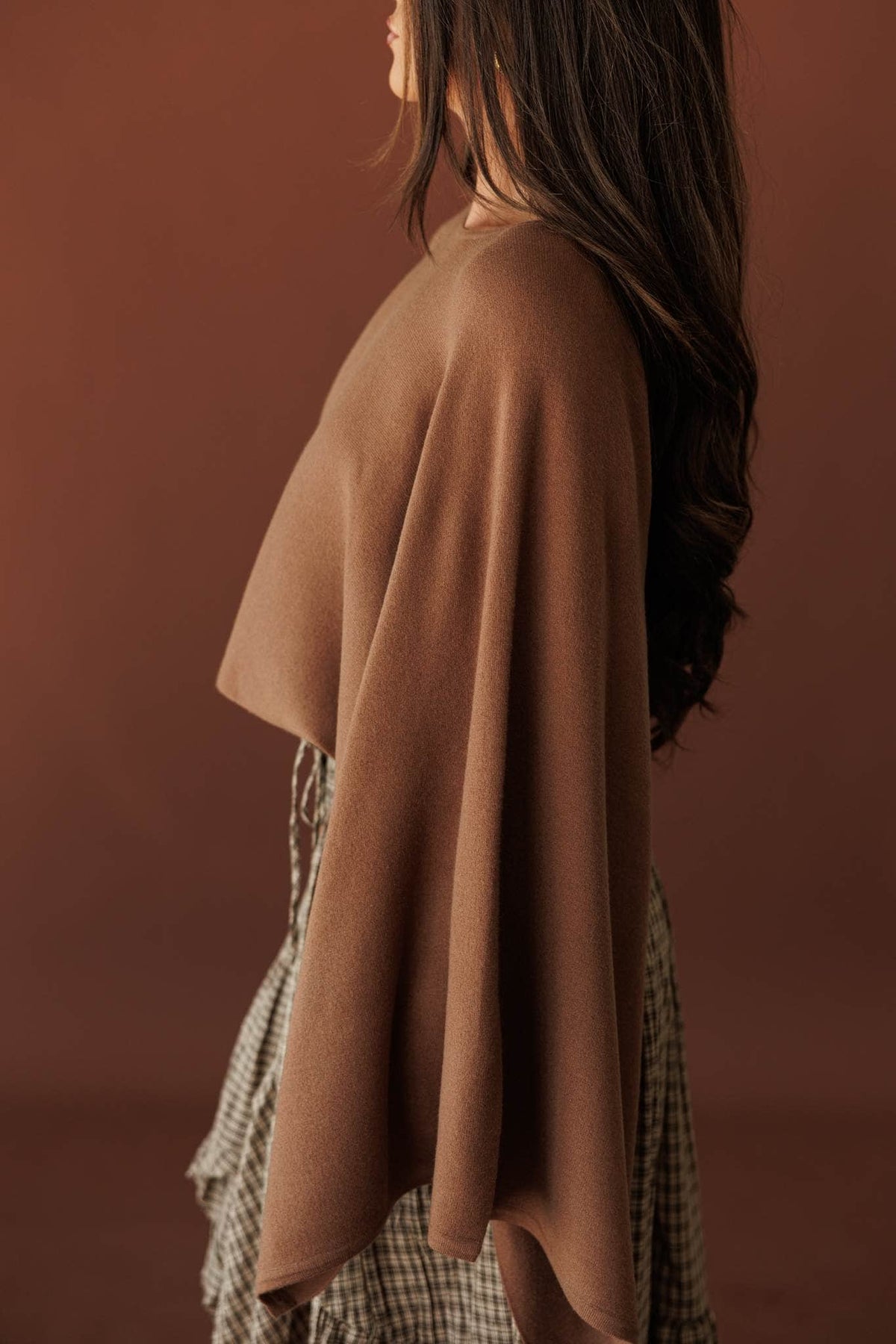 Wide Open Boat Neck Sweater, in brown, side view of the dolman sleeve