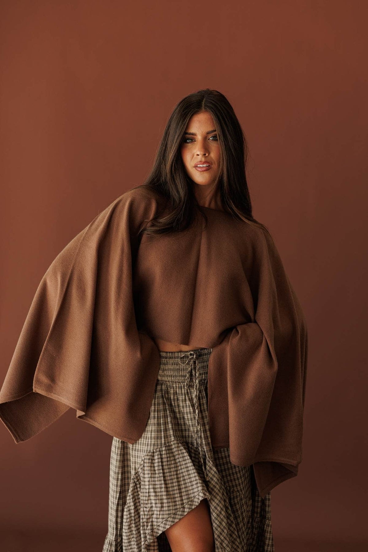 Wide Open Boat Neck Sweater, in brown, full-length view with a checked skirt