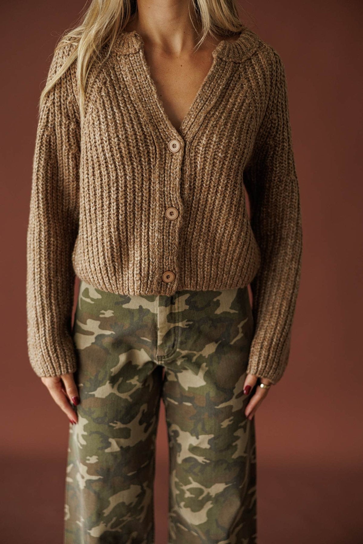 Cedar House Cardigan in sand, front view showing the button placket and ribbed knit