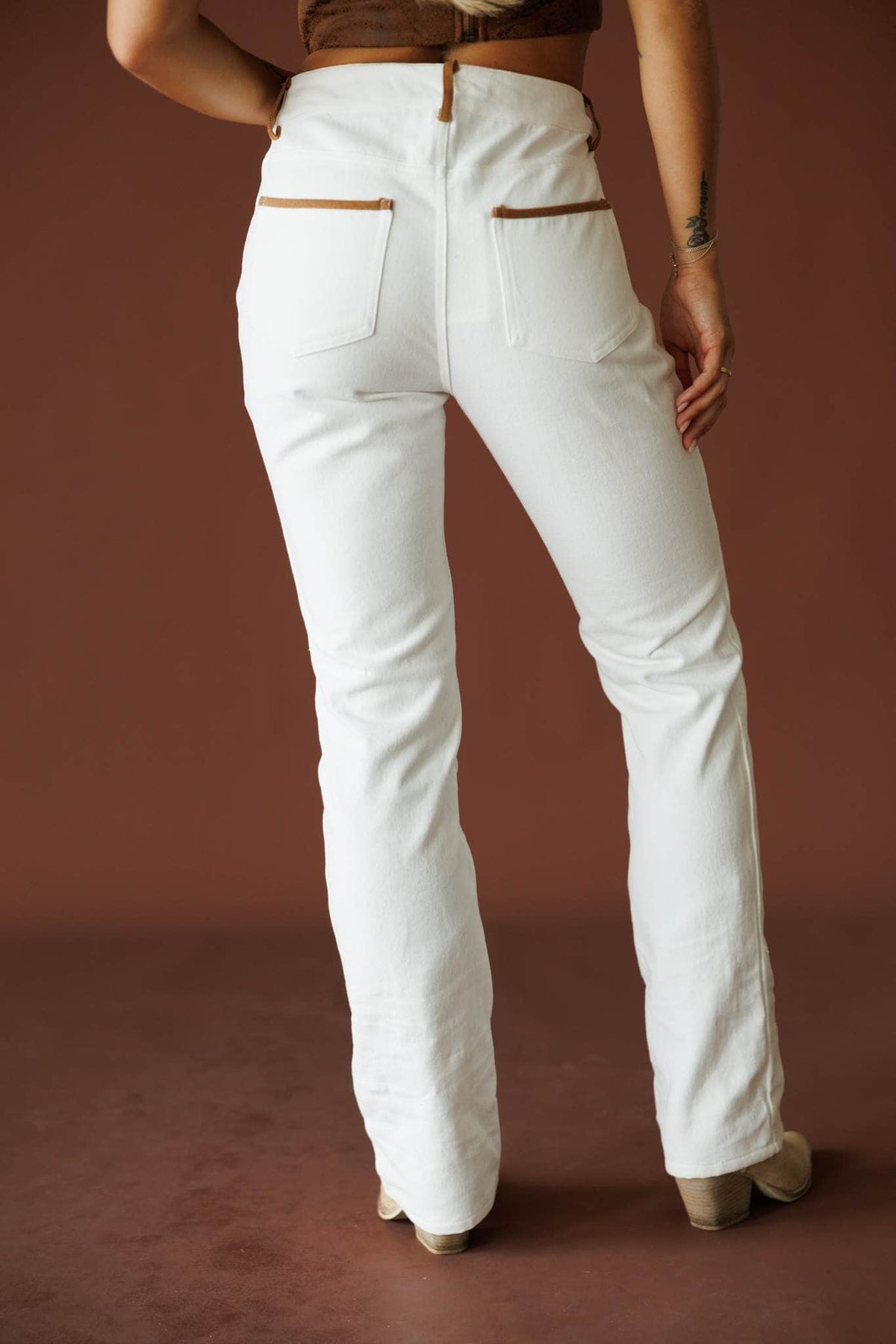 West Coast Wild Jeans in ivory, back view showing the pockets and straight leg