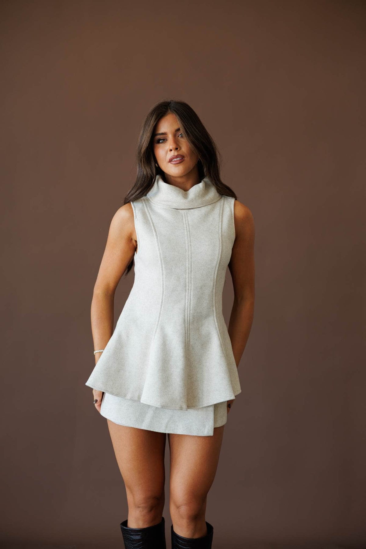 Peplum knit top, front view