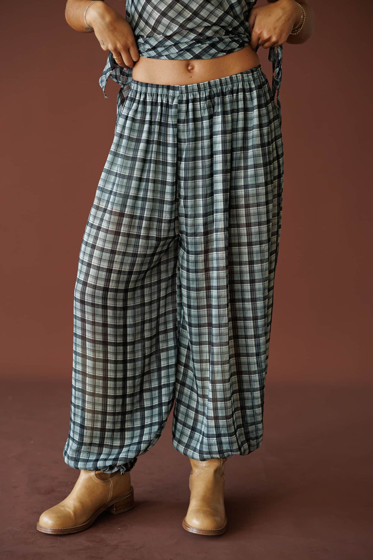Willow Retreat Pants in grey combo plaid, front close-up of the elastic waist