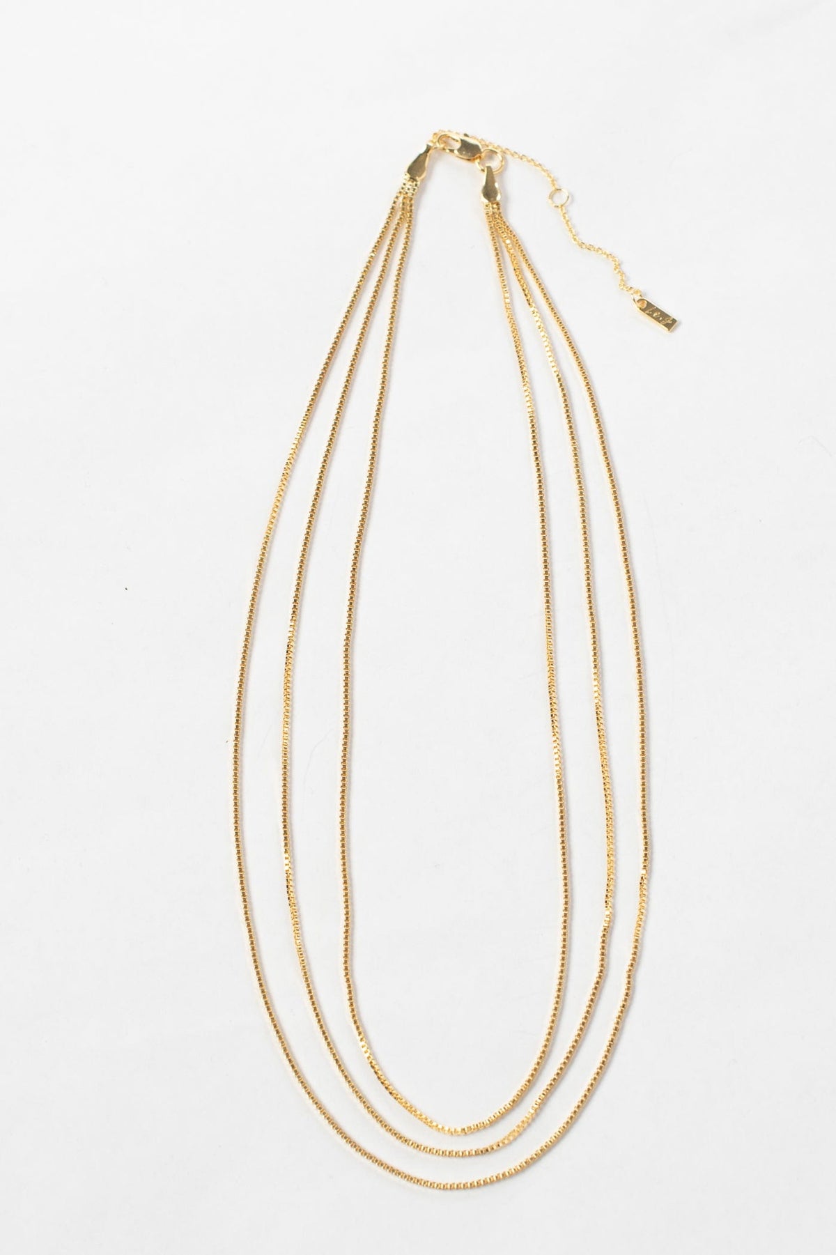 JN1021 triple strand gold necklace by together